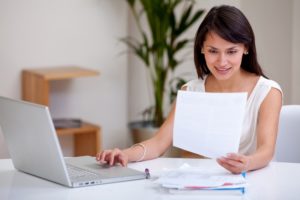 Woman working at home on a laptop computer flexible working