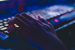 Person typing on a laptop technology