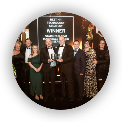 Image of staff from STARK UK and the Empowering People Group at the HR Excellence Awards 2025 holding the trophy for Best HR Technology Strategy