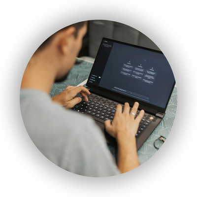 Person using an AI chatbot on a laptop