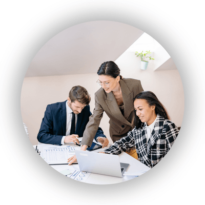Manager and colleagues working together