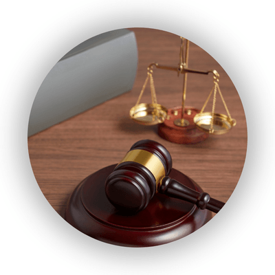 Gavel and scales on desk